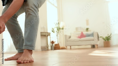 Kid Enjoys Playing Games With Parents at Home on a Playful Day While Having Fun Together
