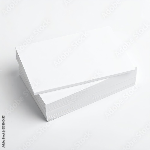 a stack of white business cards on a white background