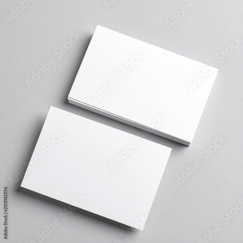 two blank cards on a grey background