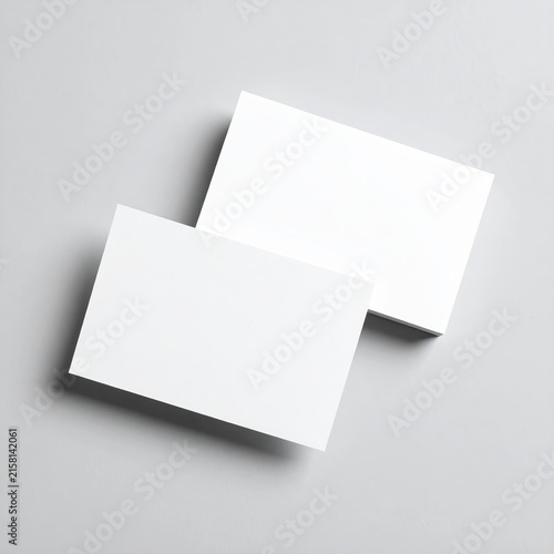 two blank cards on a grey background