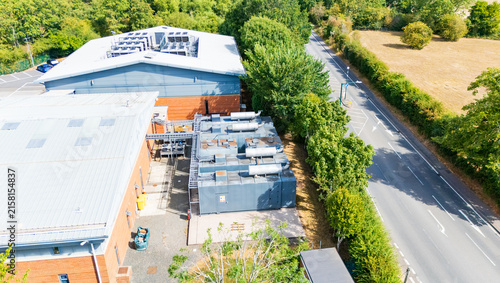 Elevated view of the critical infrastructure yard of a small data centre in Worcestershire, UK with cooling and backup generators