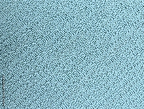Light blue textured fabric with geometric diagonal pattern