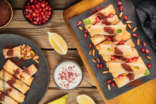 Chicken Musakhan Rolls With Yogurt Sauce