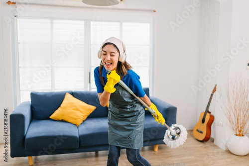 Happy Woman Cleaning Home Singing, Enjoyable Housework Lifestyle