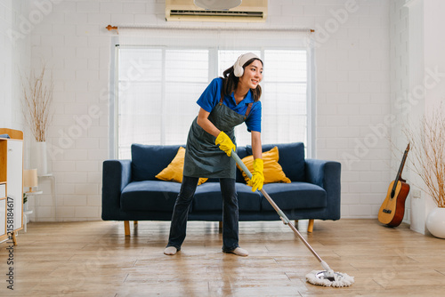 Young Woman Mopping Floor Modern Living Room Home Cleaning Service