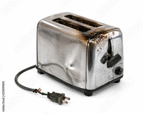 Burned Vintage Toaster Isolated on White