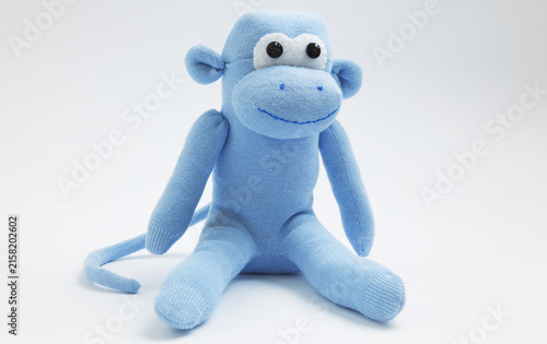 Monkey sock toy isolated on white background