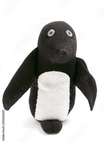 Penguin sock toy isolated on white background