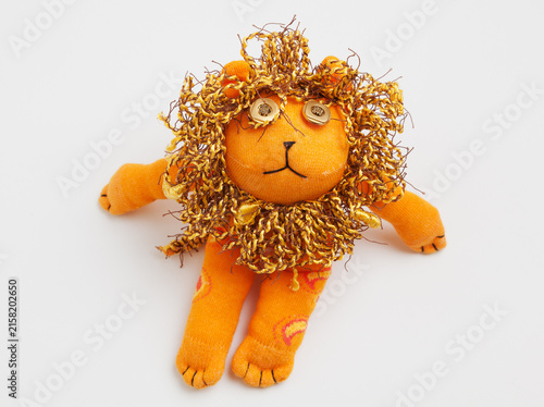 Lion sock toy isolated on white background