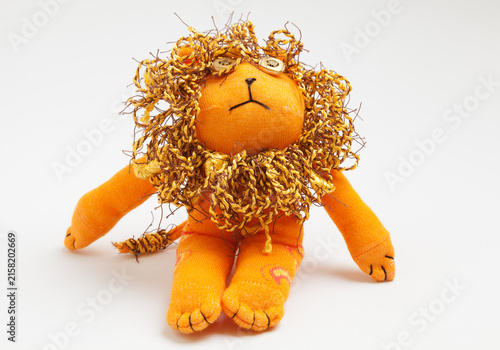 Lion sock toy isolated on white background