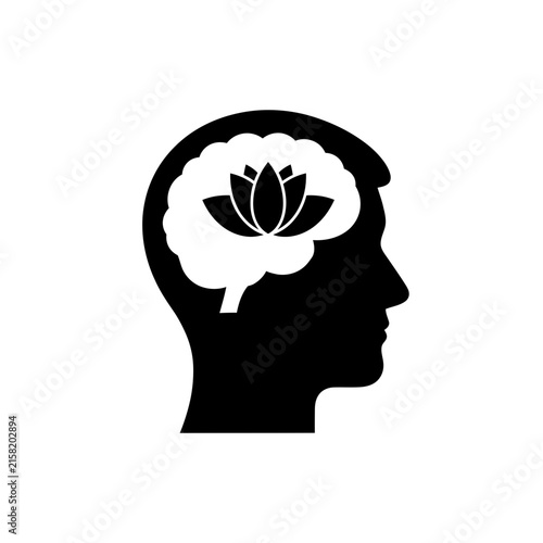 Foto Human head silhouette with a brain and lotus flower symbol represents mental health and mindfulness