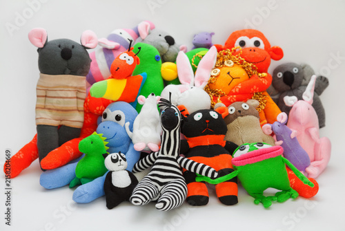Large group of sock toys on grey background