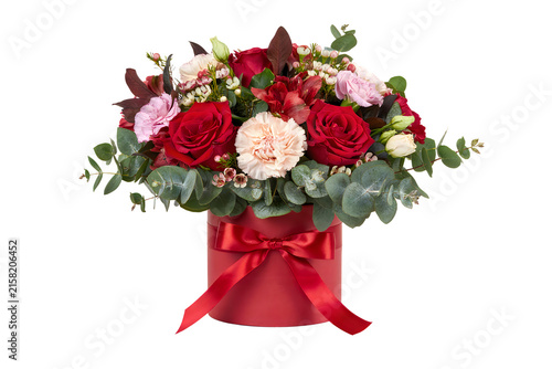 Luxurious bouquet of red roses and carnations in a gift box with a ribbon isolated on transparent background