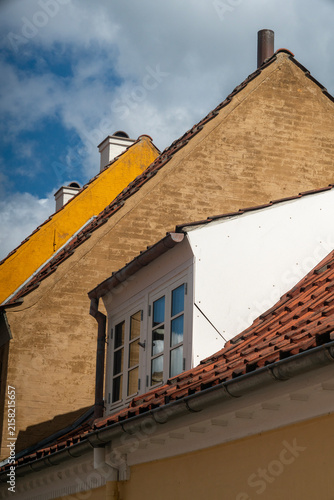 Fotografía old roofs with chimney and windows, shapes