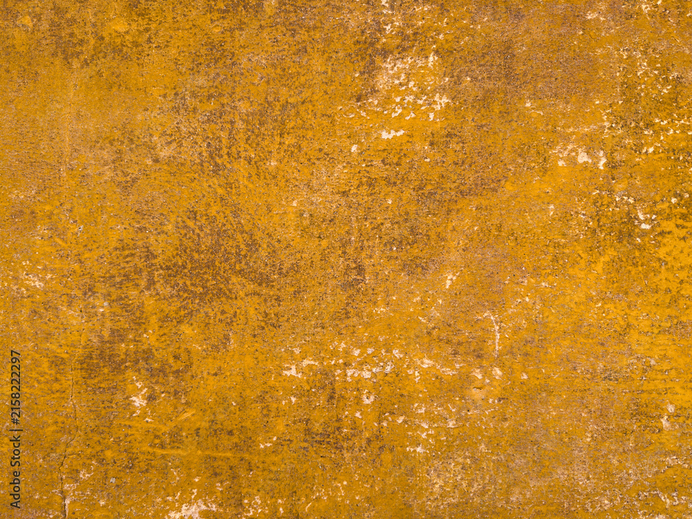 Fotografie Yellow ochre wall texture background