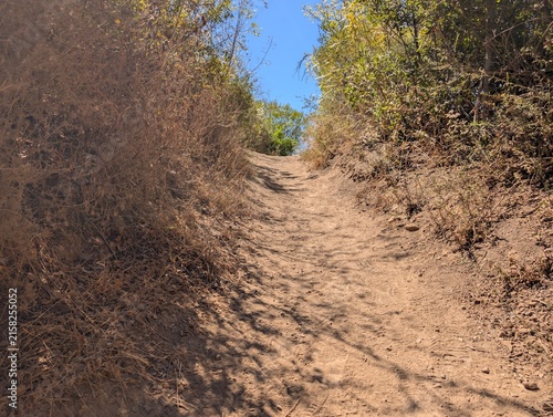 hiking trail through a mountainous pass