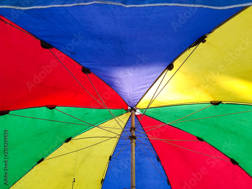 An umbrella with a rainbow concept