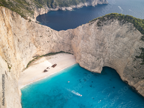 Obraz na plátně Aerial drone view of Navagio Beach, also known as Shipwreck Beach, in Zakynthos, Greece, with the MV Panagiotis shipwreck surrounded by white cliffs and turquoise waters