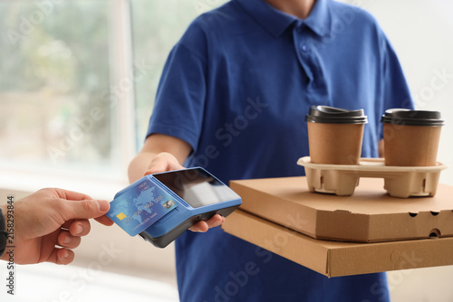 Customer paying for food an...