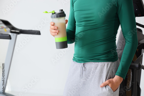 Man in green athletic shirt...