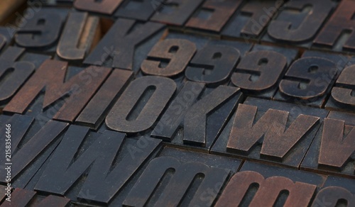 фотографія Vintage wooden letterpress type blocks typography printing press details
