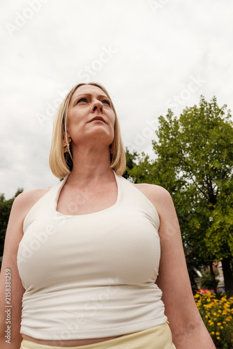 Photography Confident woman looking up with determination outdoors