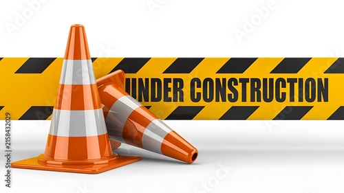 Under construction warning sign with orange traffic cones and safety barrier