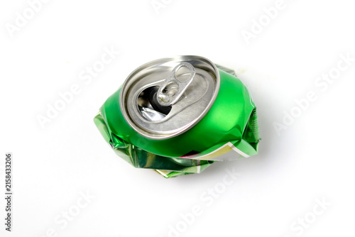 A crushed green aluminum beverage can with an opened pull tab, isolated on a clean white background