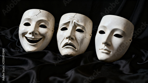 Three White Theater Masks On Black Fabric Backdrop Representing Mystery And Anonymity

