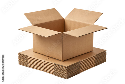 Open cardboard box resting on a stack of flat boxes