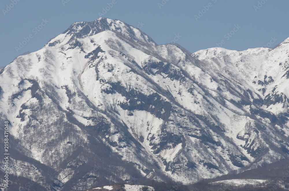 Naklejka premium 妙高山の雪形 跳ね馬 