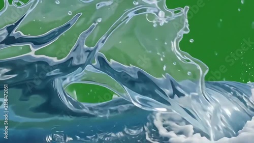 Realistic blue water wave splashing across a bright green screen background for video editing overlay and compositing effects