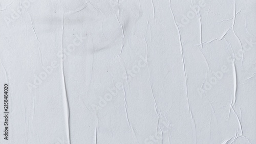 Fotografie White crumpled paper poster with abstract background and soft creased surface texture