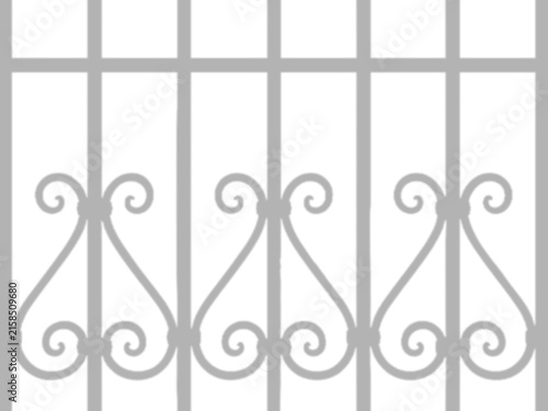 Quadro su tela Ornate Wrought Iron Fence Shadow With Decorative Scrollwork