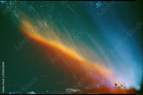 The Aurora Borealis Across a Moonlit Horizon in Vivid Colors