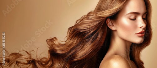 Beautiful Woman Profile Portrait with Long Shiny Wavy Hair and Natural Glowing Skin