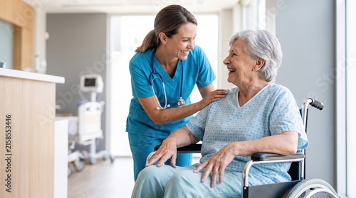 Smiling nurse in scrubs comforts a laughing elderly woman in a wheelchair in a bright hospital room; stethoscope visible, medical equipment in soft focus