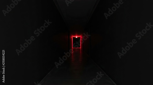 Dark hallway with a glowing red emergency exit door at the end