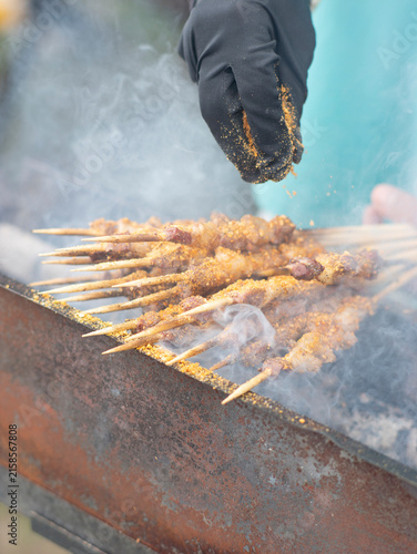Outdoor grilled lamb skewers on the grasslands of Inner Mongolia	

