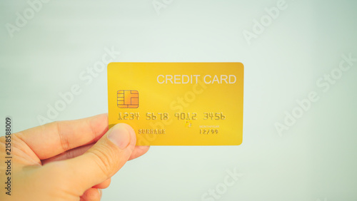 Cashless society, holding credit cards for digital banking transaction and online purchase.