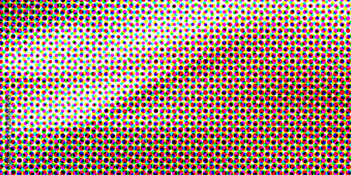 Vibrant multicolored polka dots forming a seamless repeating pattern background