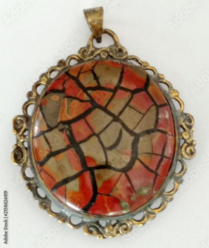 Canvastavla Visually resembles Septarian Nodule (often locally known as Batu Sisik Naga) or a stabilized matrix jasper composite with prominent dark veining