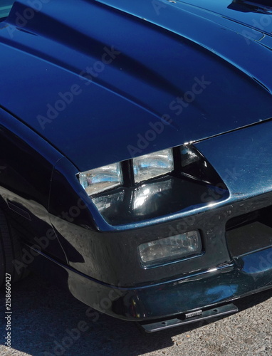Classic Sports Car Front With Hood Scoop And Headlights