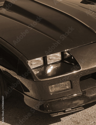 Classic Sports Car Front With Hood Scoop And Headlights