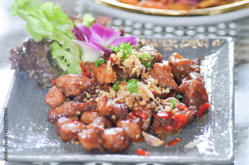 stir fried pork or deep fried pork , stir fried pork with garlic and chili