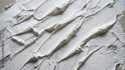 Cuadro en lienzo Close-up white oil paint texture with thick brush strokes and creamy impasto rid