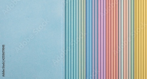 Leader scans growth metric sheet pastel bars sway chest loosens calm current weaves stable pattern clarity grows - Upright figure near column array gentle hue drapes upper band faint concept.