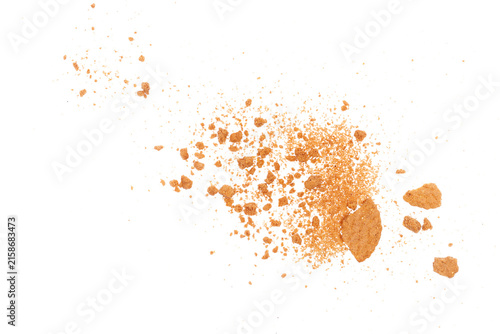 Pile cake crumbs, cookie pieces flying isolated on white background, clipping path