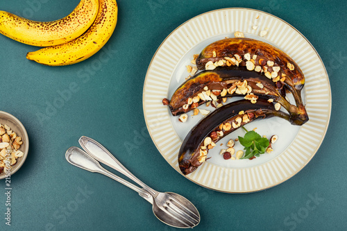 Roasted bananas with chocolate nut spread and crunchy mixed nuts.