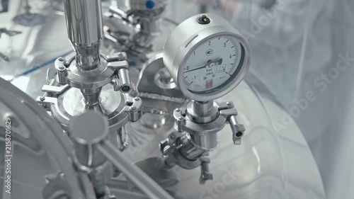 Precision pressure gauges measuring vital metrics in modern lab. Equipment and sense of scientific innovation. Factory machine at work. Production process. Equipment for industry. Close-up in 4K